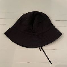 Black Bucket Hat Adjustable Tie Inside Never Worn Black Bucket Hat For Summer, One Size, Adjustable Black Bucket Hat For Summer, Black Cotton Hat, Trendy Black Bucket Hat With Short Brim, Black Summer Hat, One Size, Black Cotton Hat, One Size Fits Most, Adjustable Black Cotton Hat, Black Cotton Hat One Size, Black Cotton Hat One Size Fits Most