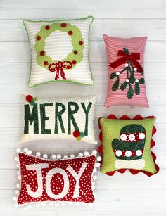 Wreath, mistletoe, mitten, Merry, Joy appliquéd pillows featured in the Mini Holiday Pillows Sewing Pattern Pillows Sewing, Cozy Holiday Decor, Holiday Sewing, Applique Pillows, Christmas Pillows, Paper Sewing Patterns, Sewing Pillows, Christmas Cushions, Holiday Pillows