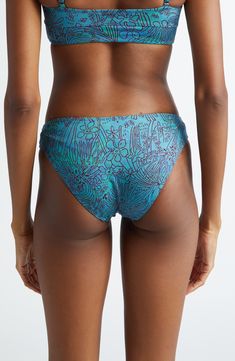 A eye-catching pattern brings sunny flair to these classic hipster bikini bottoms. Moderate back coverage Lined 80% polyamide, 20% elastane Hand wash, dry flat Made in Portugal Printed Tie-side Beachwear Bottoms, Printed Elastane Tankini For The Beach, Beachwear Swimwear Briefs In Elastane, Tie-side Bottoms For Poolside, Elastane Tie-side Bottoms For Poolside, Beachwear Swimwear With Moderate Back Coverage, Printed Elastane Swimwear For Beach, Printed Stretch Bottoms For Poolside, Blue Printed Bottoms For Sunbathing