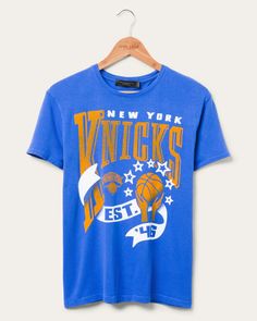 Women's Knicks Banner Vintage Tee | Junk Food Clothing Throwback Sports T-shirt With Relaxed Fit, Throwback Relaxed Fit T-shirt For Sports, Throwback Graphic Print Tops For Sports Events, Throwback Relaxed Fit Crew Neck T-shirt, Throwback Graphic Print Top For Game Day, Retro Sports Fan Merchandise Tops, Vintage Cotton Tops With Team Logo, Throwback Relaxed Fit T-shirt For Fan Merchandise, Throwback Relaxed Fit T-shirt For Fans