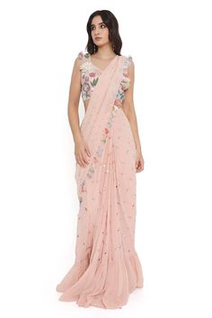 Rose pink pre-draped georgette frilled hem saree with mukaish work and tasseled border. Paired with a floral embroidered blouse. - Aza Fashions Ruffled Saree, Saree Gowns, Mukaish Work, Dhoti Saree, Cotton Sarees Handloom, Payal Singhal, Ruffle Saree, Drape Saree, Lehenga Saree