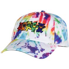 The Grateful Dead adjustable snapback adult hat is a vibrant and nostalgic piece that celebrates the counterculture band. This eye-catching hat features a classic tie-dye pattern, blending bold, swirling colors reminiscent of the 1960s psychedelic era. Adorning the front is an intricate, embroidered depiction of the Dancing Bears, a beloved symbol from the Grateful Dead's visual repertoire, rendered in vivid hues that pop against the tie-dye backdrop. The snapback design ensures a customizable f Fun Adjustable Baseball Cap For Streetwear, Fun Curved Brim Baseball Cap For Streetwear, Fun Adjustable Dad Hat For Streetwear, Adjustable Fun Dad Hat For Streetwear, Trendy Multicolor Streetwear Hats, Trendy Multicolor Hat For Streetwear, Multicolor Streetwear Hat, One Size Fits Most, Multicolor Cotton Hat For Streetwear, Fun Cotton Hats For Streetwear