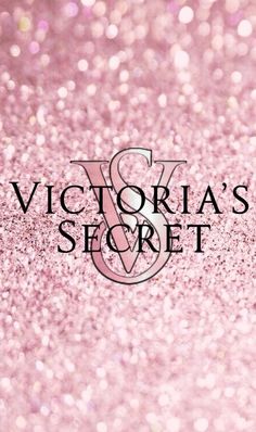 the victoria's secret logo on a pink glitter background