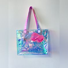 Hello Kitty Cafe Exclusive Iridescent Tote The Holographic Plastic Material Is Accented With A Confetti-Filled Bow And Whimsical Cafe Illustrations On The Straps. Ideal For Everyday Use, The Bag Measures 14x12x5. Brand New From A Smoke And Pet Free Home Whimsical Cafe, Hello Kitty Multicolor Bags For Daily Use, Iridescent Rectangular Bag For Gift, Cute Multicolor Hello Kitty Print Bag, Pink Iridescent Purse, Kawaii Hello Kitty Print Rectangular Bag, Iridescent Rectangular Shopping Bag, Hello Kitty Book, Trendy Hello Kitty Tote Bag