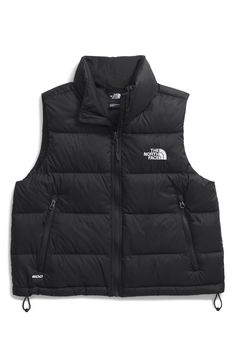 Stay warm throughout the season, whether on the mountain or in the city, in this quilted puffer vest warmed with lightweight 600-fill-power down and finished with durable water repellency. 20 1/2" length (size Medium) Front zip closure Stand collar Side zip pockets 30-denier 45 g/m² ripstop with non-PFC durable water-repellent (non-PFC DWR) finish Lined, with 600-fill-power down fill 100% recycled nylon Machine wash, tumble dry Made in Vietnam PFC/PFAS-free, durable water-repellent coating is fr Black Vest For Hiking In Fall, Black Winter Hiking Vest, Winter Hiking Black Vest, Black Down Vest For Outdoor, Nike Puffer Vest, North Face Hydrenalite, Cute Vests, North Face Puffer Vest, Northface Puffer