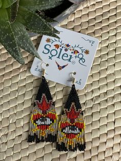 These gorgeous handmade beaded earrings is the perfect addition of color, style and beauty to any outfit! So much love and time go into making beaded jewelry. They are handmade just for you in Nayarit, Mexico. Black Bead Dangle Earrings For Festivals, Black Beads Dangle Earrings For Festival, Black Beaded Dangle Earrings For Festivals, Festival Black Bead Drop Earrings, Beach Dangle Earrings With Black Beads, Festival Black Beaded Drop Earrings, Adjustable Black Beaded Earrings For Festival, Unique Black Beaded Drop Earrings, Making Beaded Jewelry