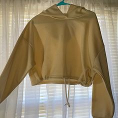 Brand New Only Worn Once! Cream Yellow Cropped Hoodie From Shein. No Stains, No Defects. Good For Spring/Fall ! Super Cozy! Has A Tie Feature For A More Contoured Look If You Wanted. Only Worn To Try It On, I Bought It For $15 And Will Sell For $10, Price Is Firm. Cream Yellow, Shein Tops, Cropped Hoodie, Spring And Fall, Try It, Yellow Color, Top Brands, Womens Tops, Sweatshirts Hoodie