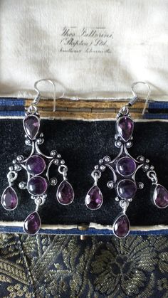 Vintage 1990-s 925 Sterling Silver Amethyst Chandelier Large Earrings - Hallmarked The item is in excellent condition. The earrings probably were never used. Weight:- 14.92 grams. Hallmarks:- 925 for sterling silver - earrings and hooks Amethyst stones are lab created. BOX IS NOT INCLUDED BUT WILL BE SHIPPED IN NICE VELVET POUCH BAG FREE WORLDWIDE SHIPPING WITH TRACKING NUMBER Amethyst Chandelier, Chandelier Large, Amethyst Stones, Velvet Pouch, Large Earrings, Amethyst Stone, Pouch Bag, Free Bag, Sterling Silber