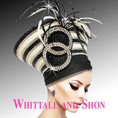 Channel the power of the Mighty Aphrodite with this stunning piece, crafted with intricate detail. Its conical shape is adorned with sparkling jewels and fanciful motifs, which add a sense of whimsy and charm. Sprouts of feathers grace the hatand add height and a sense of movement. The adjustable sweatband assures a comfortable fit for most head sizes Elegant Crystal Headpiece For Party, Elegant White Rhinestone Headpieces, Elegant Silver Headpiece With Rhinestones, Elegant High Crown Headpiece For Ceremonial Events, Elegant High Crown Headpieces For Ceremonial Use, Elegant High Crown Headpieces For Ceremonial Occasions, Elegant Evening Headpiece With Tall Crown, Elegant Tall Crown Headpiece For Evening, Embellished Headpieces For Evening