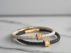 Couples Bracelets, Anniversary bracelet, Wedding Anniversary husband gift , set of 2 , Valentine's Gift ,Gold Initial Bracelet,Gold Friends Bracelets ★ Features: ★ This listing is for 2 Bracelets ;)) Initial charm : 925 Sterling Silver Gold Vermeil (Charms available- A-Z Initials ) High quality European genuine leather (5mm )with a strong hypoallergenic magnetic clasp. ★ How to Order ★ Choose your Wrist Size from those shown in the picture & at checkout add a message stating which letter bea Personalized Elegant Leather Bracelet As Gift, Elegant Personalized Leather Bracelet Gift, Elegant Personalized Leather Bracelet For Gift, Personalized Elegant Leather Bracelet Gift, Luxury Leather Bangle Bracelet Gift, Luxury Adjustable Leather Bracelet For Gift, Luxury Leather Braided Bracelets For Gift, Luxury Adjustable Leather Bracelet Gift, Elegant Adjustable Leather Bracelet For Anniversary