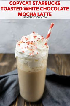 there is a drink with whipped cream and sprinkles