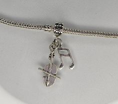 Violin Charm, Musical Note Charm, Viola Charm, Musical Charm, Music Charm, Orchestra Charm, Fits Pandora plus all Designer and European charm bracelet, fits snake chain bracelets and necklaces. **Violin Charm: 23x13mm; Musical Note: 13x8mm;  Bail: 11x8mm Hole: 5mm Zinc Alloy **All orders $45.00 and more receive free shipping within the United States **All orders are shipped immediately from Athens Ohio.  If there is an exception to this, it will be posted in the shop announcement. Please be sure Music Note Jewelry, Nota Musical, Athens Ohio, Charms Pandora, Bracelet Pandora, Snake Chain Bracelets, Bracelets And Necklaces, Chain Bracelets, Musical Note