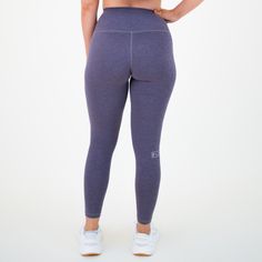 Enjoy optimal support, comfort, and added visibility with a reflective logo in El Toro - our classic FLEO legging. Grape Shark is a cool, cool purple. This heather duo is a soothing combo of quiet grape, and unforgettable shark gray. When you want to feel neutral... but a colorful version of neutral, we recommend Grape Shark. 25" inseam 7/8" length High rise 4.5" tall waistband Tight fit Lined triangle gusset Reflective logo No elastic at the top of waistband Carrah is 5'4" wearing size M Muscle Tanks, Leggings Shop, Jet Set, Racerback Tank, Long Tops, Fabric Color, Sports Bra, Top Styles, Tights