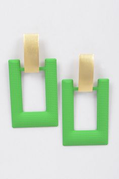 Liven up your look with these vibrant green rectangle-shaped drop earrings! Whether you’re having a ‘green’ day in the office or taking a night out, these earrings will help you make a stylish statement. Who said rectangles had to be boring?! 1.25 x 2.5" Approx WARNING: This product can expose you to chemicals including lead and cadmium which are known to the State of California to cause cancer, birth defects or other reproductive harm. For more information go to https://www.p65warnings.ca.gov/ Vibrant Green, Green Day, Who Said, Rectangle Shape, The Office, Chemicals, Latest Fashion, Night Out, California