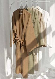 Spoil yourself with a linen bathrobe that's incredibly soft, light, and breathable. Handcrafted of premium quality European linen, this almond kimono-style bathrobe feels so good to the skin, you'll never want to take it off. The linen robe features a relaxed fit, long sleeves, an adjustable waistband, and comfy outer pockets, making it the ultimate addition to your at-home wear. The model is 175 cm (69'') tall and is wearing a bathrobe in size S/M. DETAILS - Handmade from high-quality European Summer Linen Loungewear Robe, Summer Linen Robe For Loungewear, Relaxed Linen Summer Robe, Summer Linen Robe With Relaxed Fit, Relaxed Fit Linen Summer Robe, Elegant Linen Summer Robe, Elegant Summer Linen Robe, Summer Linen Relaxation Robe, Spring Linen Sleep Robe