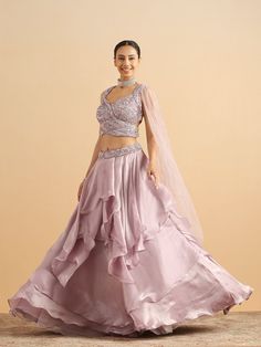 Featuring an Light Purple lehenga in organza base. It is paired with a matching blouse having sequins, cutdana and stone embellishments, including a dupatta. No of Components: 2 Components: Blouse, Lehenga Pattern: Embroidery Type of Work: Cutdana, Sequin Sleeve Type: Sleeveless Fabric: Organza Color: Light Purple Length: 44 inches Blouse: Padded Net dupatta Occasion: Destination Wedding Note:- Originally Stitched in 40 but can alter for size 38 without any extra cost. Embellished Organza Pre-draped Saree For Diwali, Embellished Unstitched Organza Sharara, Bollywood Style Embellished Tissue Silk Lehenga, Party Wear Sequin Art Silk Sets, Party Wear Art Silk Sequins Set, Anarkali Embellished Organza Sets, Embellished Floor-length Tissue Silk Choli, Floor-length Embellished Tissue Silk Choli, Party Wear Embellished Choli For Diwali