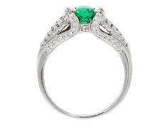 0.80 CTS Green Emerald and 0.52 CTS White Diamond 18K White Gold Ring. Measures approximately 0.98"L X 0.84”W and has a finished under-gallery. Ring comes with a GCAL Lab Report. Green Platinum Ring With Pavé Setting, Green Platinum Rings With Pave Setting, Green Pave Setting Rings For Formal Occasions, Green Rings With Pave Setting For Formal Occasions, Formal Green Rings With Pave Setting, Emerald Pave Setting Ring With Round Cut, White Gold Emerald Rings With Pave Setting, Formal Round Emerald Ring With Pave Setting, Formal Emerald Ring With Pave Setting