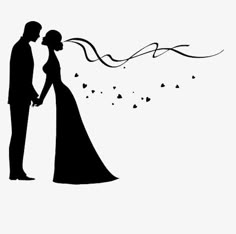 a bride and groom are holding hands in silhouette against the backdrop of falling hearts on their wedding day