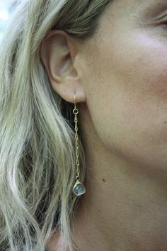 Simple, sweet and understated; Raw aquamarine are embedded in brass and dangle from our signature brass chain with handmade french earring wires. These earrings are also available in labradorite, ruby, emerald, rose quartz and tourmaline. Length 2 in This piece is handmade-to-order, please allow 1 - 2 weeks to ship unless this piece is in stock. Each piece will vary slightly due to the uniqueness of the stones. All metal is nickel free. Recycled Gold Dangle Jewelry, Long Drop Brass Jewelry With Pierced Detail, Everyday Wire Wrapped Long Drop Jewelry, Long Drop Brass Jewelry, Everyday Long Drop Wire Wrapped Jewelry, Delicate Long Drop Nickel Free Earrings, Wire Wrapped Brass Dangle Jewelry, Everyday Long Drop Brass Linear Earrings, Delicate Brass Wire Wrapped Jewelry