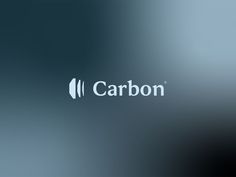 the logo for carbon is shown on a blurry background