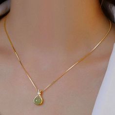 New In Box Gold Light Emerald Stone Necklace I Have Matching Earrings Too For Sale Pear-shaped Green Jewelry For Gifts, Pear-shaped Green Jewelry Gift, Green Pear Shaped Necklace For Gift, Green Pear Shaped Necklace Gift, Green Pear-shaped Necklace For Gift, Dainty Pear-shaped Jewelry Gift, Emerald Stone Necklace, Stone Gold Necklace, Vase Necklace