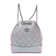 This is an authentic CHANEL Iridescent Lambskin Calfskin Small Quilted Gabrielle Backpack in Light Purple. This chic backpack is crafted of diamond stitched iridescent blue lambskin leather and a smooth calfskin leather base. The shoulder bag features aged gold chain link leather threaded shoulder straps and an open top. The top opens to a blue fabric interior with a patch pocket. Chanel Backpack Gabrielle, Chic Backpack, Light Backpack, Iridescent Blue, Leather Thread, Diamond Stitch, Small Quilts, Open Top, Lambskin Leather