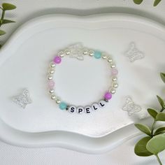 Made to order Seventeen glass beaded bracelet inspired by OT13. Don't see your favorite song? Let us know and we can work together to make something perfect! All bracelets made of glass and plastic beads on stretchy magic string - measured between 6 - 6.5 inches in width.  Don't forget to tell us who your bias is - freebies always included with every order ♡(｡ ❛ᴗ❛ ｡)♡ All sales final - we are not responsible for orders lost with Canada Post, USPS or other mail carriers. Themed White Beaded Bracelets For Birthday, Customized White Themed Beaded Bracelets, Personalized Themed White Beaded Bracelets, Personalized White Themed Beaded Bracelets, Adjustable Beaded Bracelets For Fandom Gifts, Adjustable White Themed Stretch Bracelet, Themed White Beaded Bracelets For Gift, Themed White Beaded Bracelets Gift, Svt Bracelets