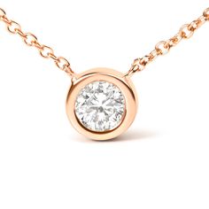 This Haus Of Brilliance 10k Rose Gold 1/10 Carat Round Brilliant-Cut Diamond Modern Bezel-Set Solitaire 16"-18" Pendant Necklace (H-I Color, Si2-I1 Clarity) Is Brand New With Tags And In Excellent Condition. Some Things Shouldn't Be Reinvented, Which Is Why We Created The Solitaire Diamond Necklace. This Understated Yet Dazzling Diamond-Forward Piece The Perfect Way To Highlight Every Big Occasion, Transition, And Personal Achievement In Your Life. This Exquisitely Simple Design Features A Singl 14k Rose Gold Jewelry With Bezel Setting, Anniversary Rose Gold Diamond Necklace With Brilliant Cut, Classic 14k Rose Gold Solitaire Necklace, Rose Gold Bezel-set Solitaire Necklace For Anniversary, Classic Rose Gold 14k Solitaire Necklace, Classic Rose Gold Diamond Necklace With Round Cut, Classic Rose Gold Sterling Silver Diamond Necklace, Rose Gold Solitaire Necklace With Bezel Setting For Anniversary, Timeless Rose Gold Diamond Necklace With Round Cut