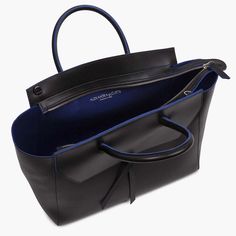 Are you ready to be that stylish woman who walks into the office with one leather tote that does it all? The Loren Tote is the ultimate everyday work bag because it’s made with our signature lightweight Italian leather that holds its shape over time, doesn’t scratch and is easy to clean. Plus, it’s spacious, stylish and so lightweight, that it won’t break your back. Sleek Satchel Bag For Work, Sleek Satchel For Workwear, Sleek Tote Bag For Workwear, Sleek Tote Bag For Work, Sleek Double Handle Work Bags, Sleek Workwear Bag, Modern Structured Travel Bag, Sleek Black Bag For Work, Sleek Black Workwear Bag