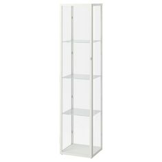 a tall white glass display case with shelves