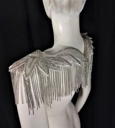 We make and ship our items really fast if you need it for a specific date please let us know. or call/text us at 954-3051817 to complete your order over the phone Exquisite jewelry grade style crystal epaulet wit a heavy rhinestone and glass beaded shoulder pieces Made with sparkling crystals and rhinestones in an ornate pattern of swirls and scrolls this crystal beaded epaulets boasts a classic design that' is a perfect complement for a one of a kind outfit. Beautifully crafted from only the be Fitted Rhinestone Bridal Accessories For Party, Fitted Bridal Accessories With Rhinestones For Party, Silver Rhinestone Bridal Accessories For Formal Occasions, Silver Beaded Bridal Accessories For Party, Formal Silver Bridal Accessories With Rhinestones, Glamorous Crystal Bridal Accessories For Party, Elegant Embellished Fitted Bridal Accessories, Silver Crystal Bridal Accessories For Party, Silver Rhinestone Bridal Accessories For Evening