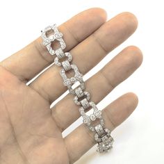 Slim vintage and Art Deco inspired diamond platinum bracelet. Adorned with white round cut diamonds in 6.18 carat total. Diamonds are all natural in G-H Color Clarity VS. Platinum 950 metal. Length: 17.2 cm Width. 1.2 cm Weight: 28.4 g [shortcode] [video] [/video] [/shortcode] Art Deco Diamond Tennis Bracelet With Brilliant Cut, Art Deco Diamond Tennis Bracelet With Single Cut Diamonds, Art Deco Diamond Tennis Bracelet For Anniversary, Diamond Art Deco Tennis Bracelet For Anniversary, Platinum Diamond Bracelet With Pave Setting, Silver Brilliant Cut Diamond Bracelet In Art Deco Style, Silver Platinum Diamond Bracelet With Single Cut Diamonds, Art Deco Silver Diamond Bracelet With Brilliant Cut, Art Deco Diamond Bracelet In White Gold