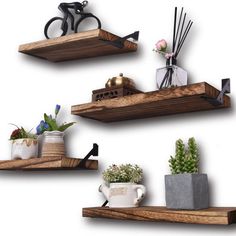 three wooden shelves with plants and vases on them