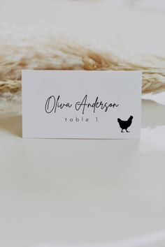 A place card with a chicken graphic and the name "Olivia Anderson" for a rustic wedding table setting. Wedding Place Cards With Meal Choice, Placecards Wedding Table, Place Cards With Meal Choice, Rustic Place Cards, Chicken Graphic, Place Card Table Wedding, Country Theme Wedding, Themed Weddings, Table Place Cards