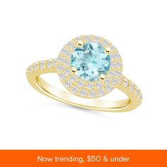 an engagement ring with blue topaz and diamonds in yellow gold, featuring the words now trending $ 50 & under