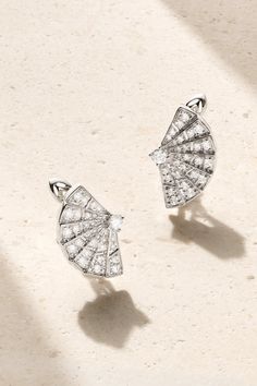 Garrard's 'Fanfare Symphony' earrings celebrate the opulence and elegance of theater in the 18th century. Hand-cast from 18-karat white gold, they're set with sparkling white diamonds in delicate segments. Wear yours with the coordinating necklace. Luxury Platinum Diamond Earrings Hallmarked, Elegant Platinum Diamond Earrings, Evening White Gold Pierced Bridal Earrings, Luxury Platinum Drop Earrings, Luxury Brilliant Cut Bridal Earrings For Evening, Luxury Platinum Diamond Earrings For Evening, Luxury Brilliant Cut Diamond Earrings For Evening, Elegant Platinum Earrings For Evening, Elegant Evening Platinum Earrings