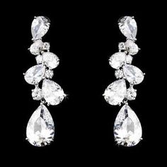 CZ%20Bridal%20Earrings%0D%0AThese%20sparkling%20antique%20silver%20plated%20bridal%20earrings%20will%20add%20a%20glamorous%20touch%20to%20your%20wedding%20day%2C%20prom%20or%20special%20occasion!%20These%20gorgeous%20crystal%20earrings%20feature%20cascading%20teardrop%20and%20round%20CZ%20crystals.%0D%0ASize%3A%202%22%20long.%0D%0AColor%3A%20Silver.%0D%0AStyle%3A%20e5882.%0D%0AA%20beautiful%20accessory%20for%20the%20bride%20or%20her%20bridesmaids!%0D%0ASilver%20plated.%0D%0AFor%20Pierced%20Ears.%0D%0ANeed%20several%20pair%20of%20earrings%20for%20your%20wedding%20party%3F%20You%20can%20buy%20in%20bulk%20and%20save!%0D%0APlease%20allow%201%20week%20for%20delivery.%0D%0AShipping%20Policy.%0D%0AReturn%20Policy Cubic Zirconia Bridal Earrings, Diamante Earrings, Pink Tourmaline Crystal, Formal Earrings, Pear Earrings, Dazzling Earrings, Bridal Wedding Earrings, Prom Earrings, Bling Wedding