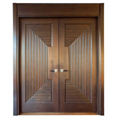 two wooden doors with decorative designs on them