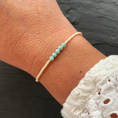 Delicate Adjustable Hypoallergenic Bracelets, Minimalist Braided Bracelet With Tiny Beads As Gift, Minimalist Braided Bracelet With Tiny Beads For Gifts, Minimalist Beaded Braided Bracelets, Minimalist Hand-strung Friendship Bracelets As Gift, Minimalist Everyday Braided Bracelets With Round Beads, Minimalist Braided Bracelets With Round Beads For Everyday, Minimalist Handmade Everyday Stretch Bracelet, Minimalist Handmade Stretch Bracelet For Everyday