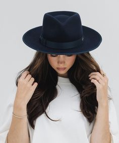 Our Monroe Rancher felt fedora hat is a bestseller for good reason, this quintessential wool fedora hat stands the test of time making it the perfect staple in any wardrobe. The Monroe Rancher is a hat with a teardrop shaped crown, stiff upturned brim, and is paired with a tonal grosgrain band. These beautiful combinations make this felt fedora hat a classic. Classic Wide Brim Panama Hat For Fall, Classic Panama Hat With Curved Brim For Fall, Modern Fitted Hat With Flat Brim, Classic Curved Brim Fedora For Fall, Modern Curved Brim Hat For Fall, Modern Fitted Fedora With Flat Brim, Modern Fedora With Short Brim For Everyday, Classic Fedora With Curved Brim For Fall, Classic Fitted Fedora For Fall