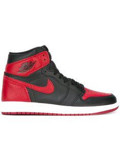 Supplied by a premier sneaker marketplace dealing with unworn, already sold out, in demand rarities. Each product is rigorously inspected by experienced experts guaranteeing authenticity. The Air Jordan 1 High in the iconic black and red colorway returned once again in 2016 as part of the “Banned” campaign celebrating the history of the shoe. The legendary silhouette is presented in its "OG" iteration featuring an accurate shape and materials to compare to its original release. Simply put, the A Jordans Black And Red, Tenis Nike Air, Red Jordans, Black Jordans, Black Nike Shoes, Jordan Shoes Girls, By Any Means Necessary, Jordan Air, Nike Air Jordans