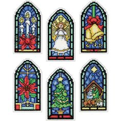 six stained glass windows with christmas decorations