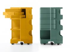 two pieces of furniture sitting next to each other on casteors, one in yellow and the other in green