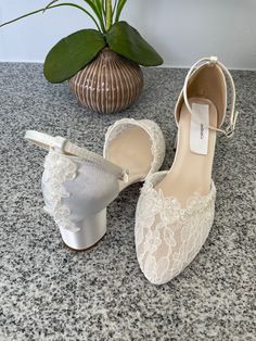 "Classic Wedding comfortable block 2 1/4\" heel shoes, front lace and satin heel adorned with a beautiful beaded with pearls edging embellishment, please look at the pictures. available in sizes: 5M to Please look at all the pictures! contact for additional questions, or concerns. NO RETURNS NO EXCHANGES, FINAL SALE, PLEASE CONTACT FOR ANY QUESTIONS CONCERNS." Elegant Low Heel Wedding Shoes With Lace Trim, Lace Wedding Shoes With Almond Toe, Elegant Closed Toe Heels With Lace Trim, White Lace Ankle Strap Wedding Shoes, White Lace Wedding Shoes With Ankle Strap, Formal Wedding Shoes With Lace Trim And Closed Toe, Lace Closed Toe Heels With Lace Trim, Lace Wedding Shoes With Block Heel For Party, Lace Closed Toe Wedding Shoes For Formal Occasions