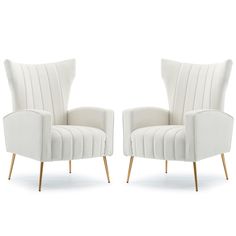 two white chairs sitting next to each other