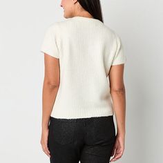 Crafted from a cozy, textured knit in a soft ivory hue, this Liz Claiborne women's short-sleeve pullover sweater is perfect for both casual and dressed-up looks during the cooler months. It's cut for a classic-fit and has a split crew neckline adorned with delicate, sparkling button details along the front placket. Wear yours with wide-leg pants and heels. Closure Type: ButtonFit: Classic FitNeckline: Split Crew NeckSleeve Length: Short SleeveApparel Length: 25 InchesFiber Content: 46% Polyeste… Color Crema, Small Sweater, Sweater White, Short Sleeve Sweater, Knit Short, Short Sleeve Pullover, Knit Shorts, Textured Knit, Short Sleeved Sweaters