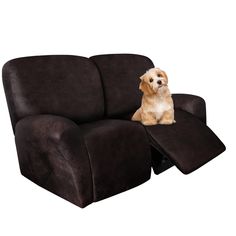 a small dog sitting on top of a brown reclining couch with its head resting on the armrests