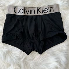 Calvin Klein Icon Micro Low Rise Trunk Size Small Color Ck Black Nwot | Never Worn | Brand New Condition About The Icon Micro Low Rise Trunk Iconic Redefined. This Low Rise Trunk Is Updated With A Broad Signature Logo Waistband In Bronze. Crafted From Silky Soft Microfiber Fabric With An Ergonomic Design For Ultimate Comfort. * Icon Micro Low Rise Trunk * Iconic Logo Waistband Design * Silky Microfiber With Soft Stretch * Ergonomic Pouch For A Supportive Fit * Extended Leg Panels To Prevent Chaf Fitted Calvin Klein Boxer Briefs, Calvin Klein Cotton Black Boxer Briefs, Calvin Klein Black Cotton Boxer Briefs, Black Multi-pack Bottoms For Loungewear, Black Bottoms Multi-pack For Loungewear, Stretch Black Boxer Briefs With Letter Print, Black Fitted Multi-pack Boxer Briefs, Calvin Klein Boxer Briefs, Calvin Klein Boxers