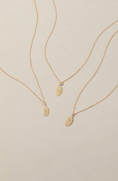 Display your sign daily with this handcrafted zodiac pendant necklace that will personalize any stack. 18" length 14k-gold fill Made in the USA Zodiac Pendant Necklace, Horoscope Necklace, Zodiac Signs Aries, Sagittarius And Capricorn, Capricorn And Aquarius, Zodiac Pendant, Taurus And Gemini, Zodiac Horoscope, Oval Pendant