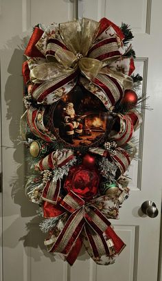 a christmas wreath hanging on the front door